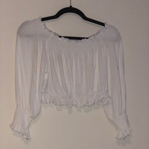 Cropped long sleeve off the shoulder top